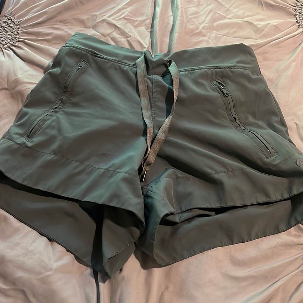 green athletic shorts